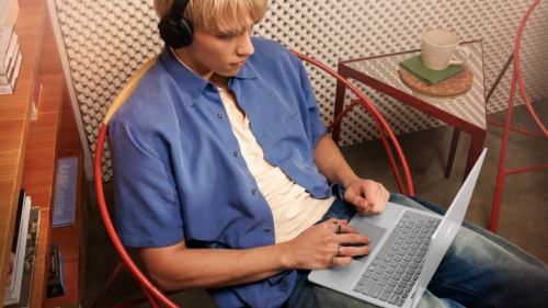 A person working with Surface device