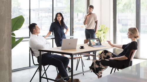 Professionals working at a table.