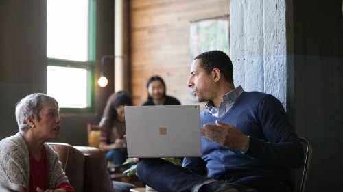 Professionals discussing strategy.