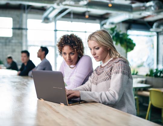 Two women working in an office