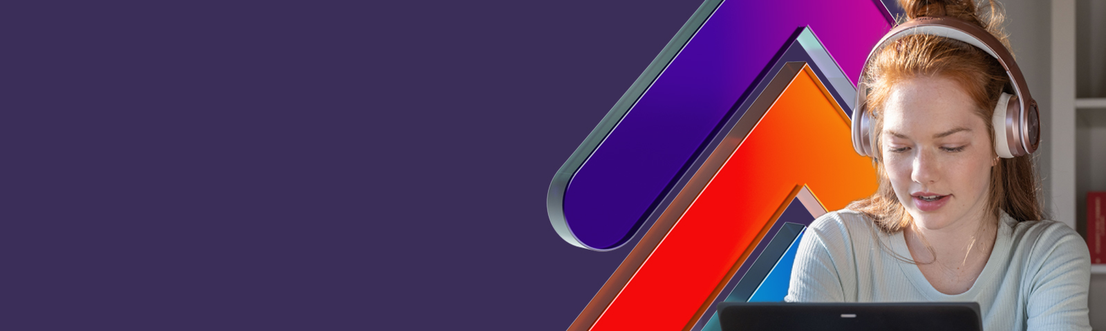 Image of young girl, headphones on and using a Surface surrounded by Skilling branding - bright pops of purple and orange