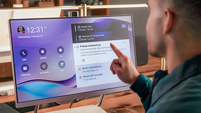 A man using the Surface device to check his calendar